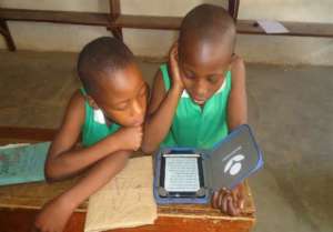 Kutamba students with E-reader