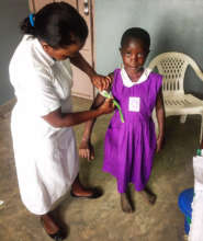 Nyaka student during a malnutrition assessment