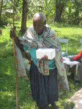 Nyaka Granny with her new solar powered light.