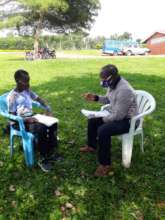Study session with a Nyaka teacher and student