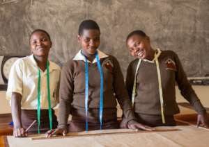 Miria, Rinah, and Nauma in Tailoring class