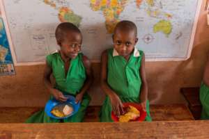 Children at Kutamba Primary School enjoying lunch