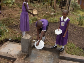 Students washing their dishes