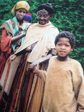 Ethiopian child leading two blind adults