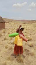 A young girl sent to collect water.