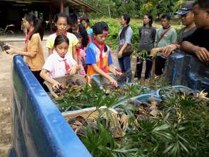 Nature Camp Participants Prepare to Plant Saplings