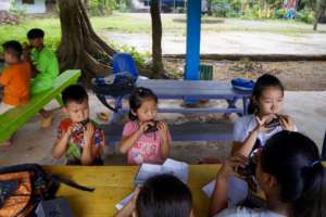 Students learning to play the Ocarina