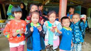Students Holding Handmade Snacks
