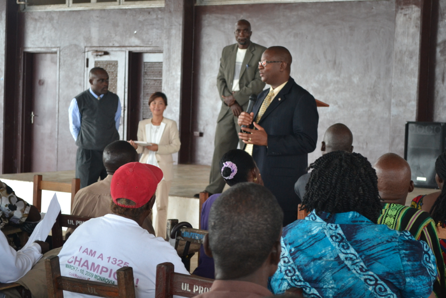 Deputy Minister of Education giving certificates