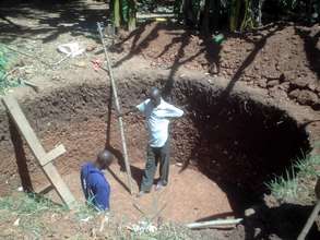 An excavated biogas digester pit in Nkondo