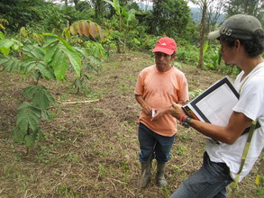 Team member talking to a local farmer