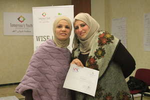 Rafeef (Rafeef's Cuisine) displays her certificate