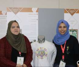 Reham & Saja take part in an exhibition.