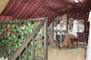 Work, pastries, and coffee at Bait Al Dyafa