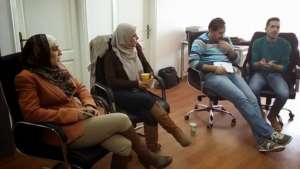 Sahar in a training and mentoring session