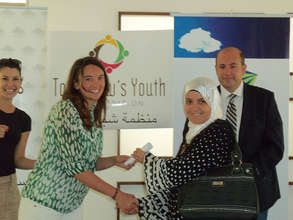 TYO Director Andres Smith presents WEL award