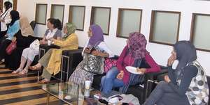 WEL participants prepare for a training