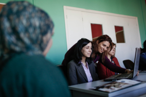 Roula receives business training support.