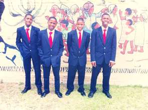 Our boys standing PROUD in their new uniforms!