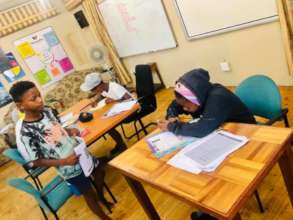 Dedication to education! Kids busy with studies!