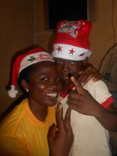 Ifeoma snaps with a sibling of the FLA Kids