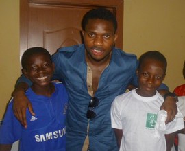 Yobo poses with FLA Kids