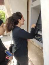 Symbolizing Safya learning to use the ATM