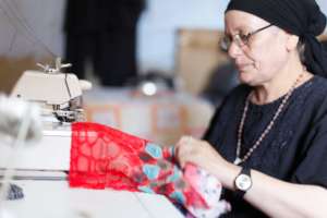 B'edaya mother during working in her business