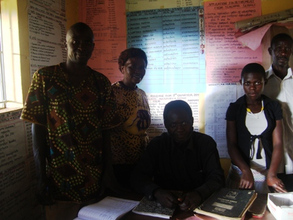 Joy in her former school with some of her teachers