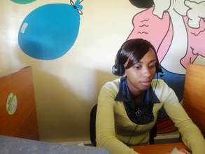 Hellen on phone with children at the Helpline