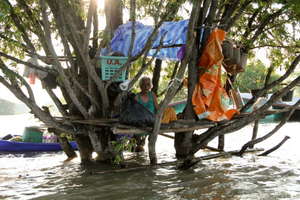 An elderly lady lives in a temporary home