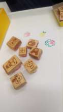 Decorated wood pieces by eraser stamps