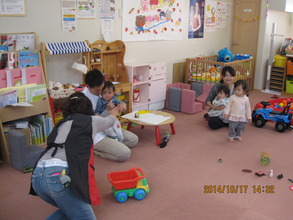 Mothers are busy playing with children.