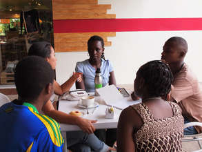 New students practicing Spanish at EARTH's cafe