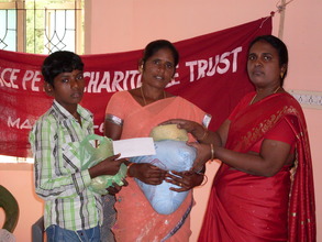 A Target Child is receiving the nutrition food