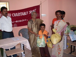 A Target Child is receiving the nutrition food