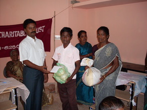 A Target Child is receiving the nutrition food