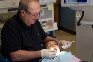 A young person receiving dental care in a SBHC