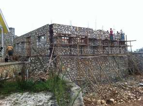 The school with the 60,000 gallon cistern below it
