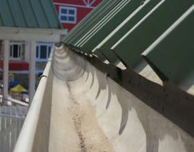 The gutters are dry and awaiting rain.