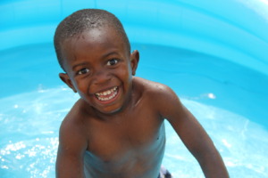 Loving the water and playing with his friends!