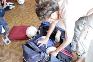Unpacking the bags of donated gear