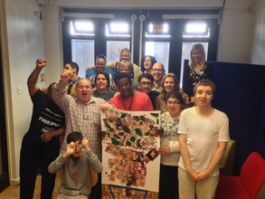 Students and volunteers showing off their artwork!