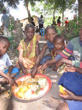 Children enjoying an OFSP meal