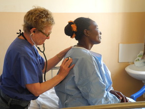 Dr. Taylor examining a patient
