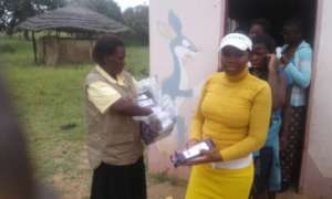 White Angles Girls Group receiving sanitary items