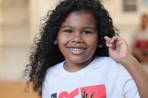 Student dancing to Marsha Goodman-Wood Singing