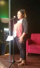 Student presenting her poem