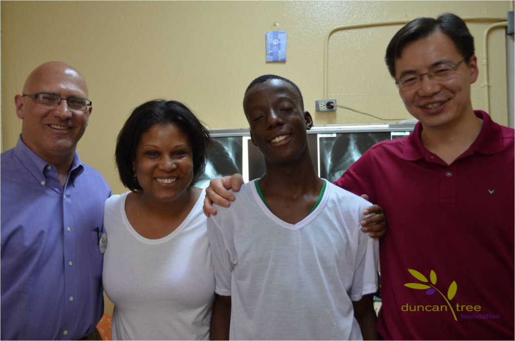 A former Duncan Tree Patient with volunteers