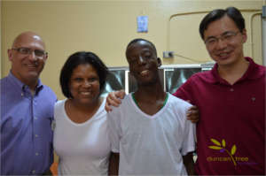 A former Duncan Tree Patient with volunteers